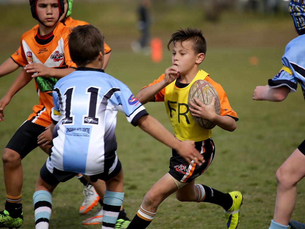 Action from the junior rugby league game in Sydney.