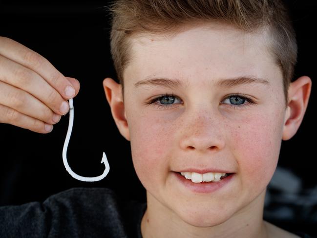 27/9/2019 Hawthorndene Primary School student Fraser invented and 3D printed a biodegradable fishing hook to tackle pollution and animal welfare issues, pic fishing off Brighton Jetty