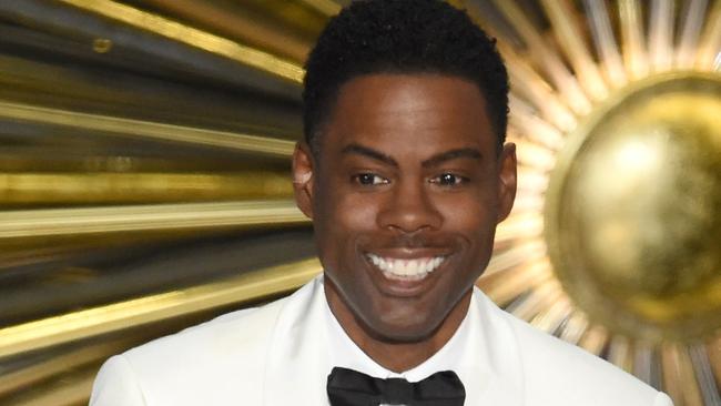 HOLLYWOOD, CA - FEBRUARY 28: Host Chris Rock speaks onstage during the 88th Annual Academy Awards at the Dolby Theatre on February 28, 2016 in Hollywood, California. Kevin Winter/Getty Images/AFP == FOR NEWSPAPERS, INTERNET, TELCOS & TELEVISION USE ONLY ==