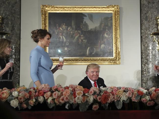 First lady Melania Trump stands as President Donald Trump is called for a toast, during the inaugural luncheon at the Statuary Hall in the Capitol on January 20, 2017, in Washington. Picture: AP