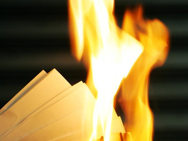 03 May 2005: Financial papers going up in flames. picRussell/Shakespeare fires burning generic