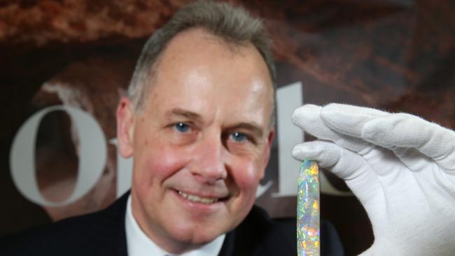 Brian Oldman (Director, South Australian Museum) at the Science Centre, with the Virgin Rainbow Opal, the finest opal ever unearthed, estimated worth in excess of a million dollars. Picture: Stephen Laffer