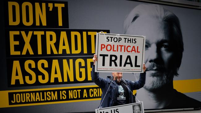 A protester outside London’s Old Bailey court. Picture: AFP