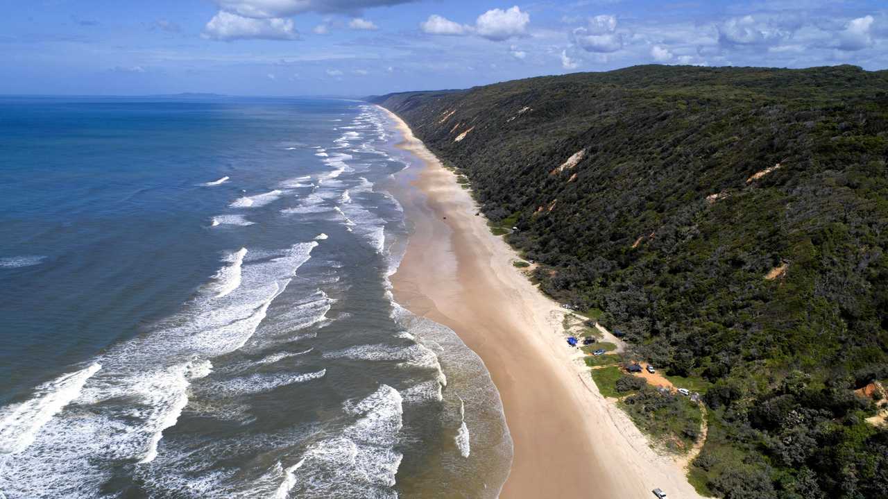 Firefighters extinguished a car fire on Noosa North Shore this afternoon. Pictured: Aerial drone photos of Teewah Beach, Great Sandy National Park, Queensland. Picture: Patrick Woods