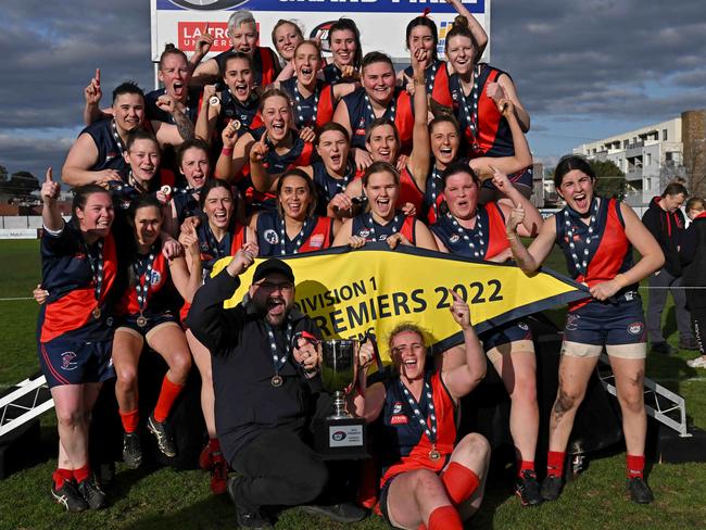 Diamond Creek players and coach Colin Wallington celebrate with the premiership cup after the NFL D1 womenÃs grand final between Diamond Creek and Darebin in Preston, Sunday, Aug. 21, 2022. Picture: Andy Brownbill