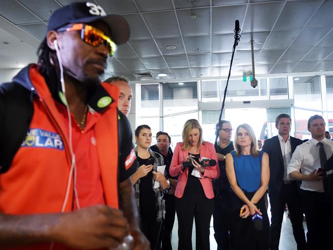 Chris Gayle managed to avoid commenting on the looks of female journalists waiting for him at Melbourne Airport this morning. Picture: AAP