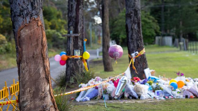 Flowers, tributes and mementos left at the site of the crash in Buxton in which 5 teenagers lost their lives. Picture: Julian Andrews