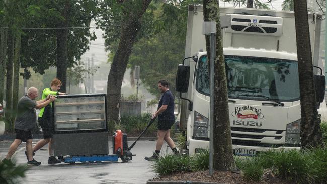 Residents and businesses prepare for Cyclone Alfred. Picture: NewsWire / Glenn Campbell