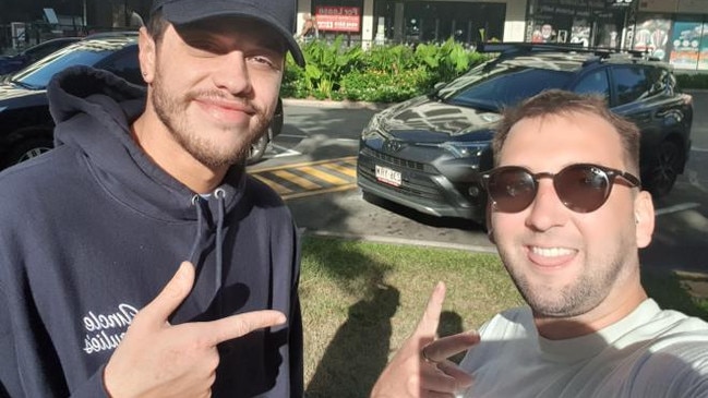 Actor and comedian Pete Davidson posing for pictures with fan Sean Fitzgerald on Cairns Esplanade. Photo: Instagram/@seanontour Copyright: Supplied