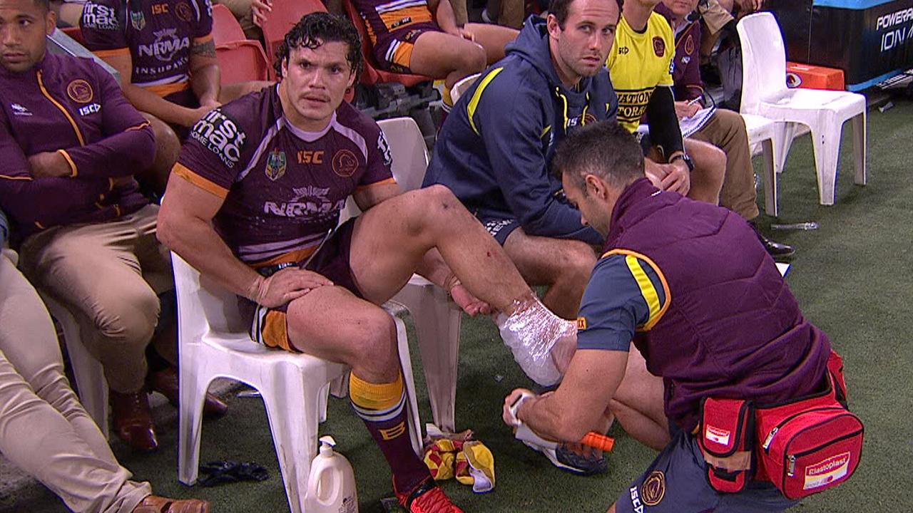 James Roberts goes off for the Broncos with an Achiles injury.