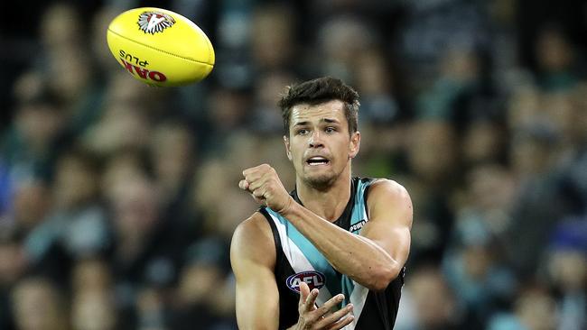 Ryan Burton against North Melbourne on Friday. The former Hawthorn player has a good record against Collingwood. Picture SARAH REED