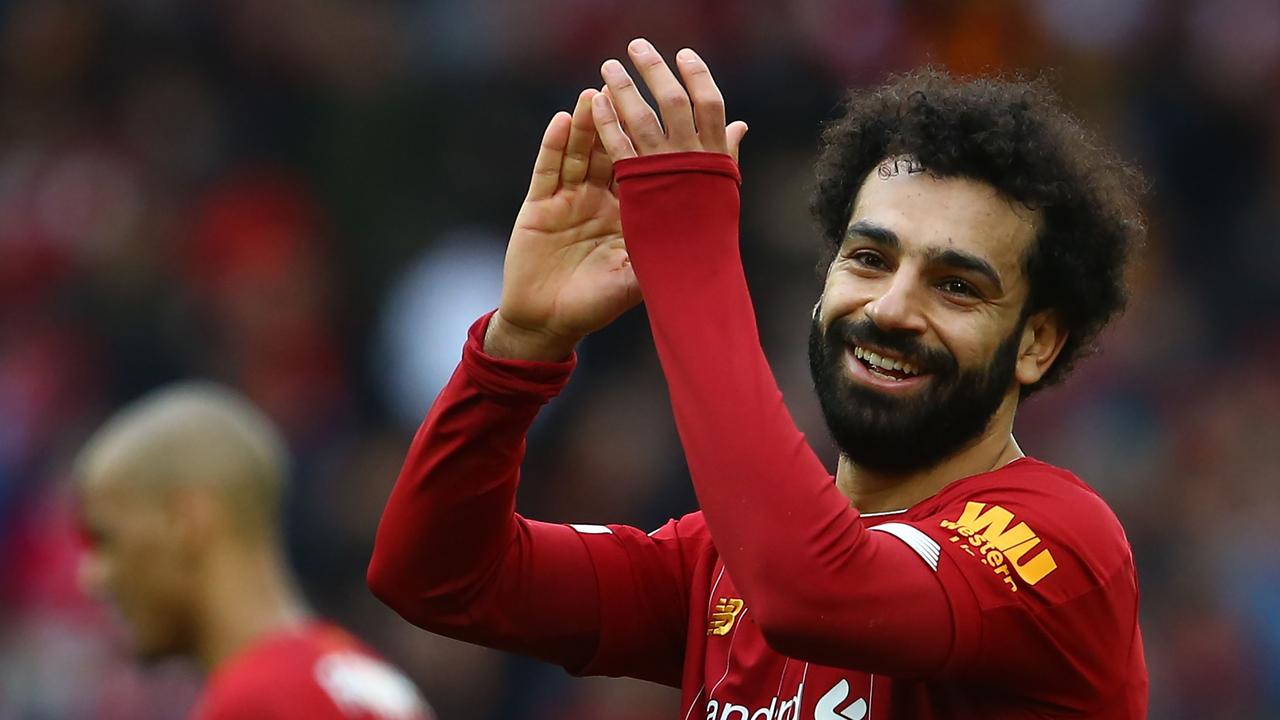 Liverpool's Mohamed Salah is their top earner. (Photo by GEOFF CADDICK / AFP)