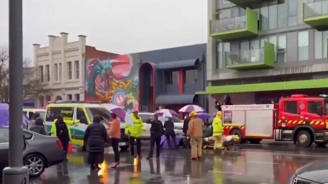 A young girl and woman have been rushed to hospital after being hit by a car during peak hour on Angas Street. Major Crash officers are investigating. Picture: 7NEWS