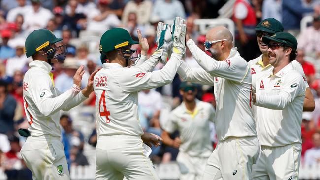 Nathan Lyon (R) secured the breakthrough for Australia after a tough opening hour. Picture: AFP