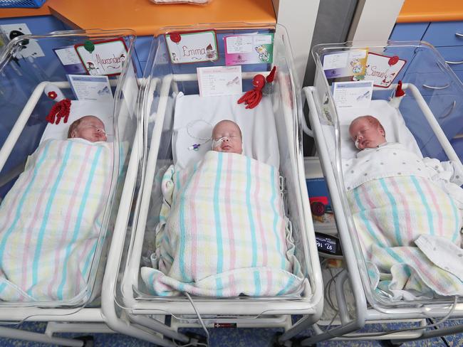 Triplets (L-R) Alexander, Emma and Samuel Ward. Picture: LUKE BOWDEN