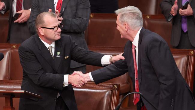 Kevin McCarthy shakes hands with Troy Nehls during the third day of elections for Speaker of the House. Picture: Getty Images via AFP.