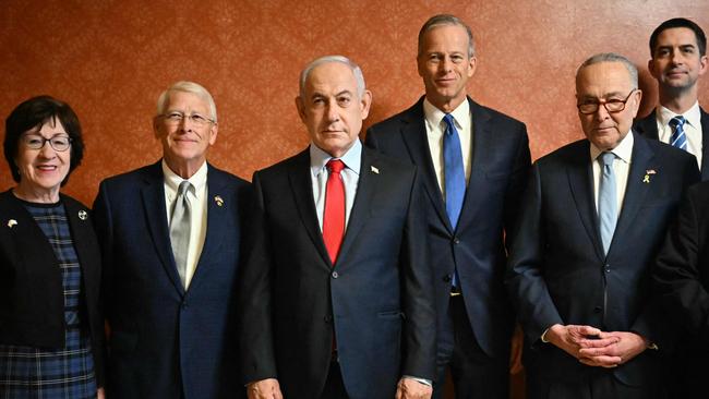 Benjamin Netanyahu (3rd L) with, L-R, Senators Susan Collins, Republican from Maine, Roger Wicker, Republican from Mississippi, Senate Majority Leader John Thune Republican from South Dakota, Senate Minority Leader Chuck Schumer, Democrat from New York, and Senator Tom Cotton, Republican from Arkansas, at the US Capitol in Washington, DC. Picture: AFP