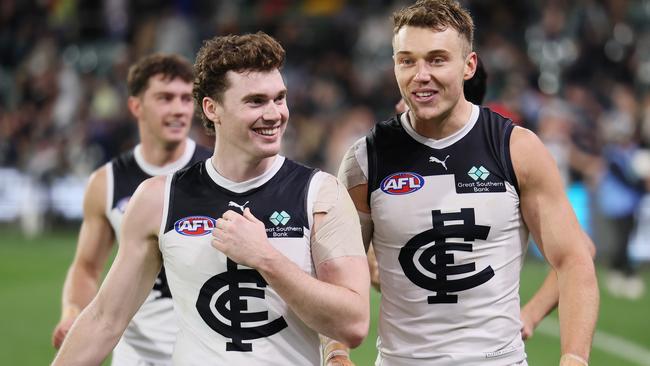 Second-year Blues wingman Blake Acres (left) has signed a contract extension through to the end of 2027. Picture: James Elsby / Getty Images