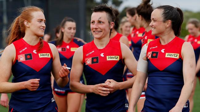 Blaithin Mackin, Karen Paxman and Daisy Pearce after completely outplaying Essendon. Picture: Dylan Burns/AFL Photos via Getty Images