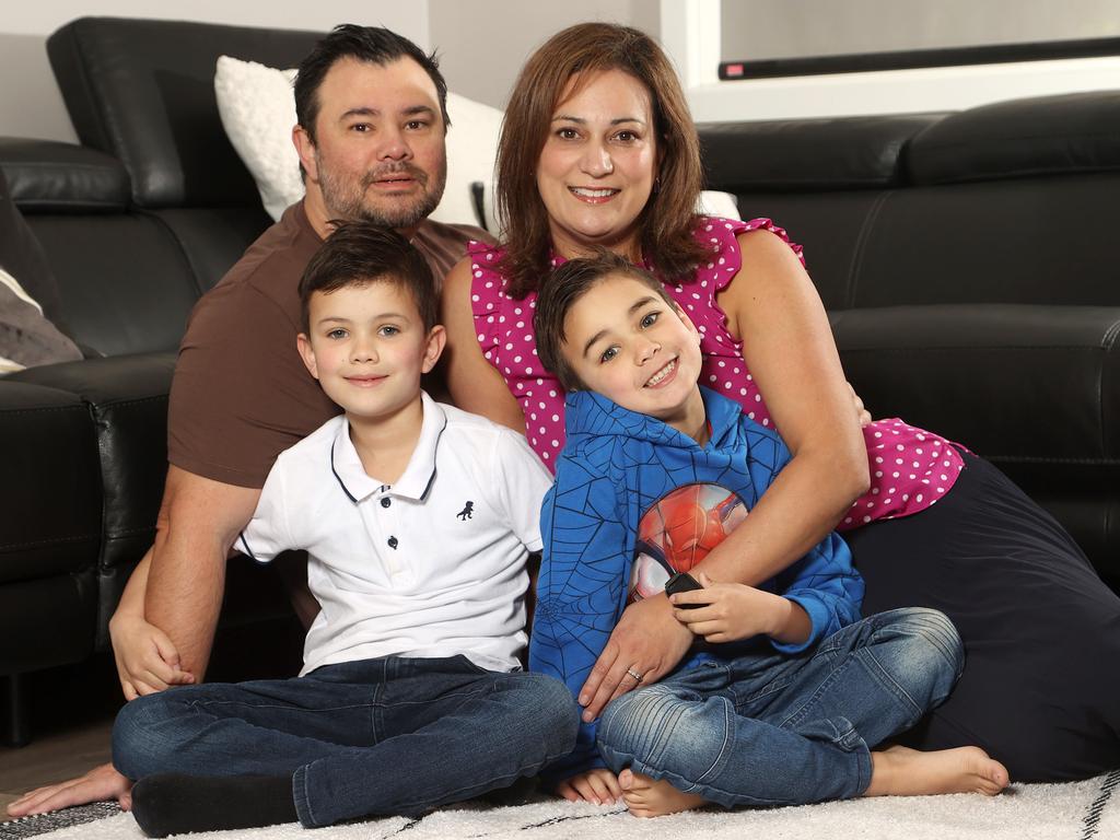 Caleb (right) and his family — mum Tania Rafferty, dad Anthony Borgonha and older brother Blake. Picture: Andrew Tauber