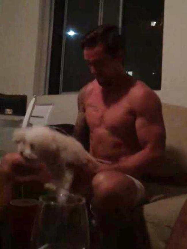 Mitchell Pearce simulating a sexual act on a dog. Picture: DiiMEX