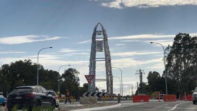 Stage one of the installation of Corey Thomas' 12 metre tall lighthouse sculpture on the new Bayshore Drive Roundabout at Byron Bay.