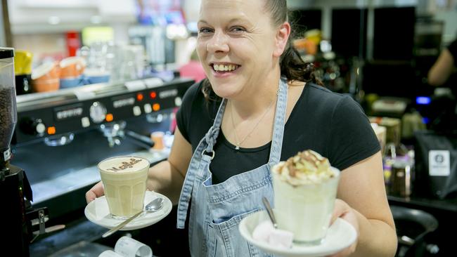 Mazbah Cafe’s Kerrie McKay serving up a white chocolate mocha and white hot chocolate with marshmallows and whipped cream. Picture: EDDIE SAFARIK