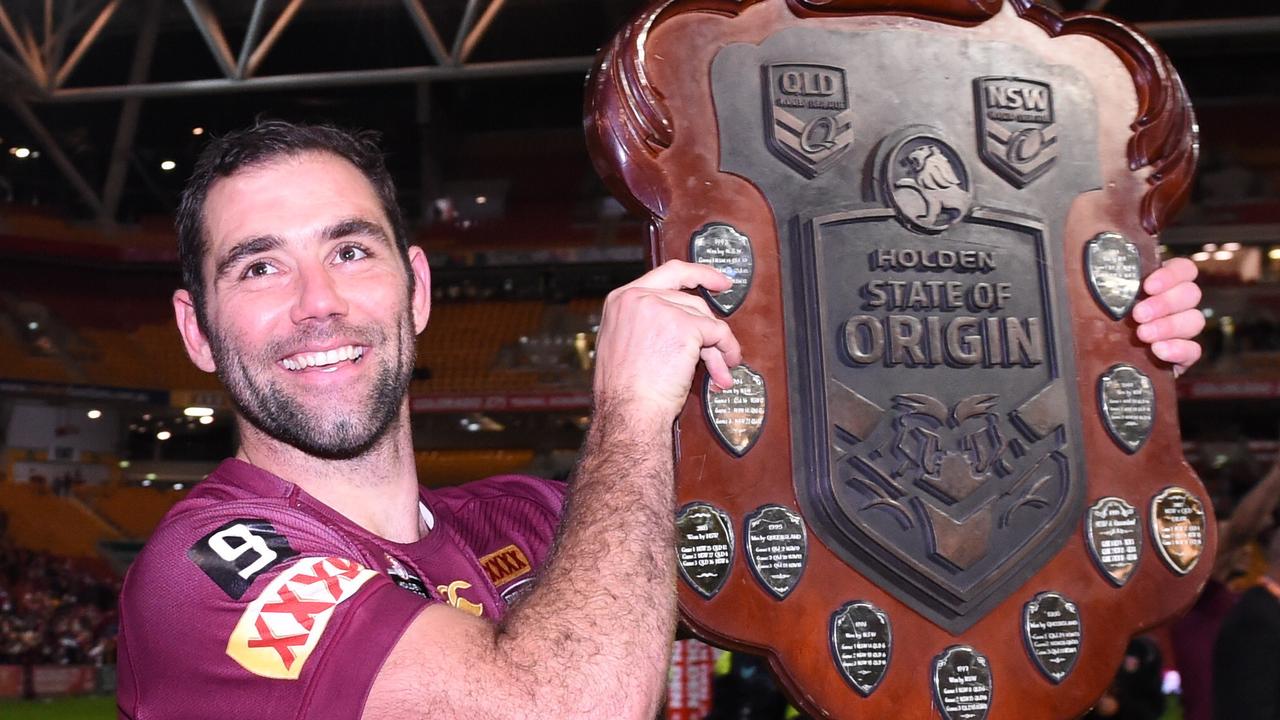 Then Queensland captain Cameron Smith with the Holden-sponsored State of Origin shield in 2015. Picture: AAP Image/Dave Hunt