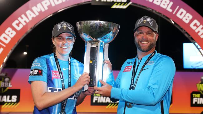 Tahlia McGrath and Strikers coach Luke Williams with the WBBL spoils. Picture: Mark Kolbe/Getty Images