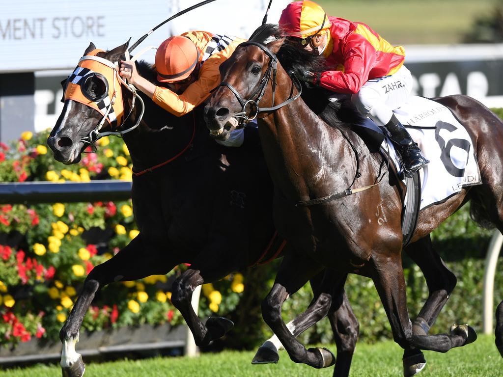 Levendi, ridden by Mark Zahra (right), takes out the 2018 Australian Derby.