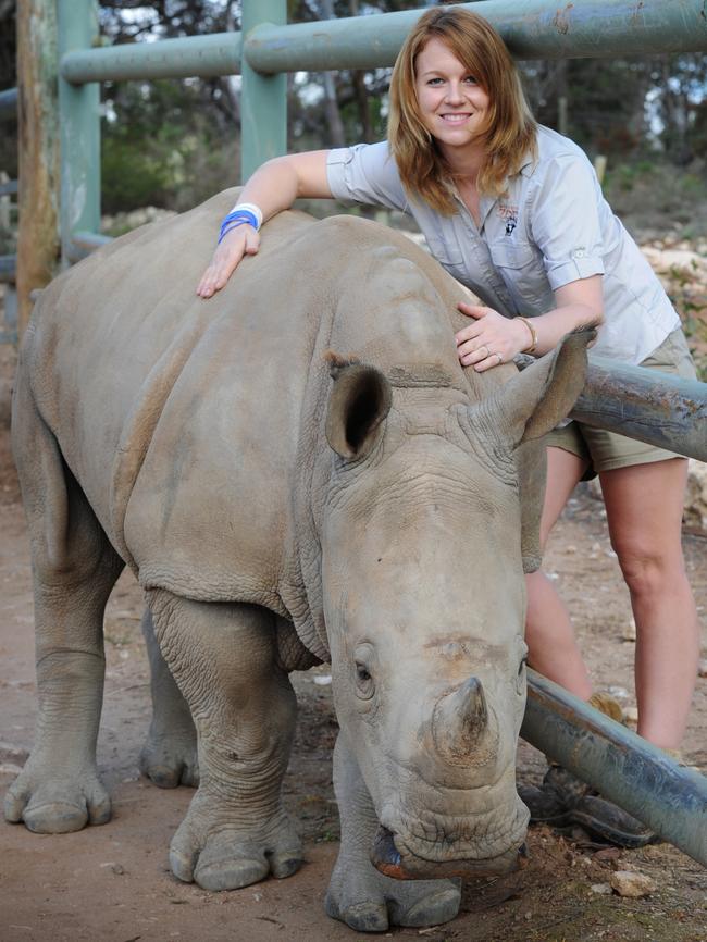 Rhino keeper Tess Stevens with Tundu at Monarto Zoo in September 2016. Picture: Michael Marschall