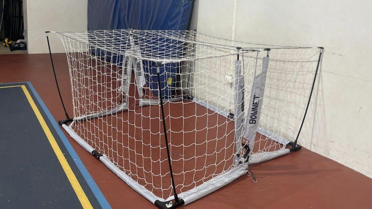 An alleged makeshift cage using two mini goal nets, where at least one child was placed during an assembly at a QLD school. Picture: Supplied