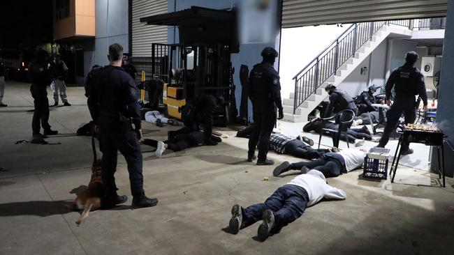 During the search, police located 12 individuals allegedly identified as members and associates of the Nomads OMCG gathered at the premises. Officers located and seized ledgers, a quantity of cash, alcohol, and unlicensed bar equipment.