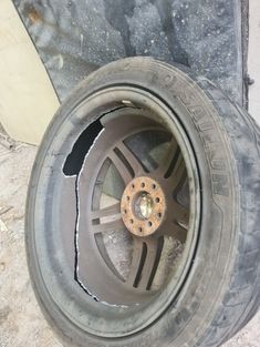 A cracked tyre from a pothole on the bridge near the Cheviot tunnel on the Melba Highway. Photo: Supplied.