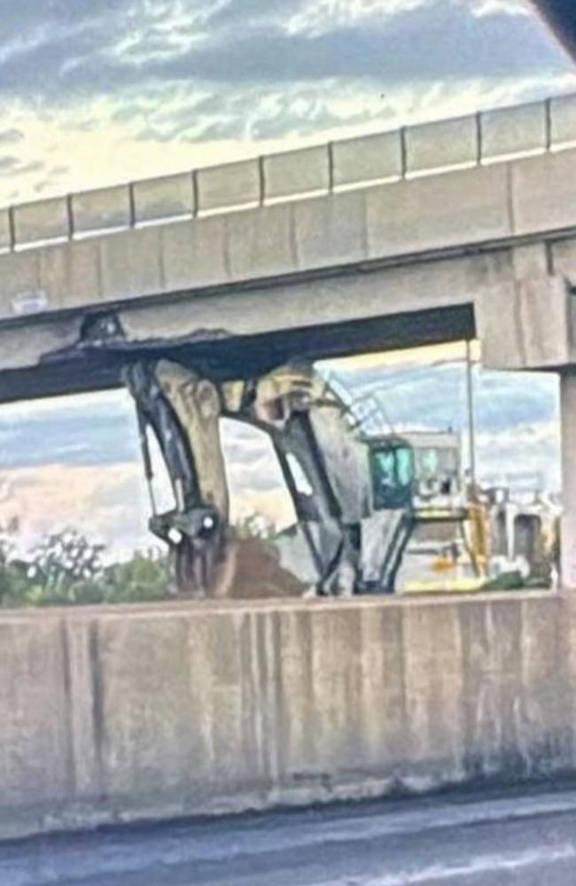 The Peak Downs Highway at near Caval Ridge mine remains closed after an excavator being moved on a mine road struck and damaged the overpass.