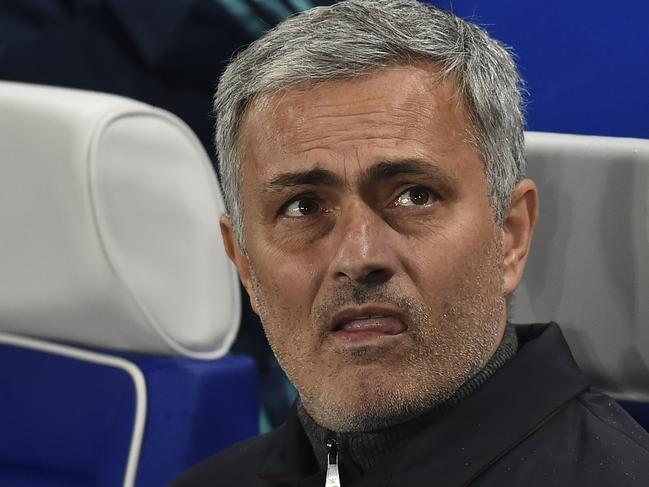 Chelsea's Portuguese manager Jose Mourinho takes his seat for the UEFA Champions League Group G football match between Chelsea and Porto at Stamford Bridge in London on December 9, 2015. AFP PHOTO / BEN STANSALL