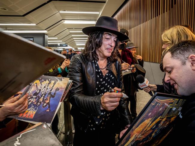 Paul Stanley signs autographs for fans upon arrival at Melbourne Airport to begin the Australian leg of the End of the Road Tour. Picture: Jake Nowakowski