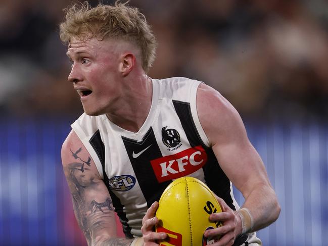 John Noble gathers the ball in his last game for Collingwood. Picture: Darrian Traynor/Getty Images.