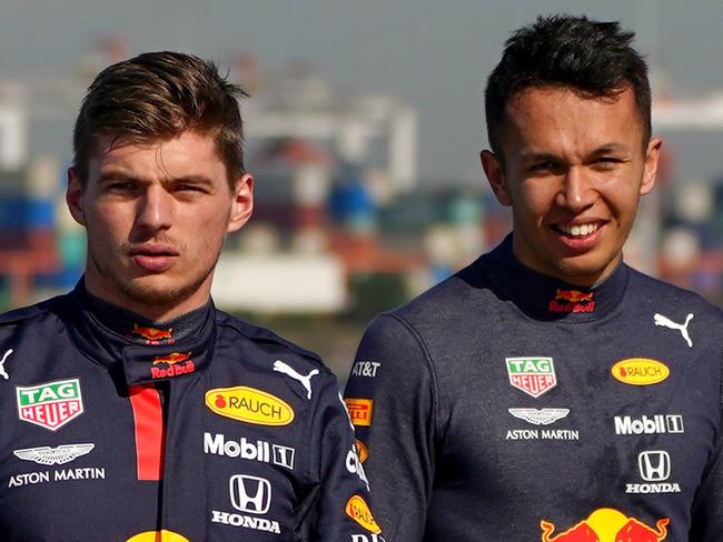 Max Verstappen of the Netherlands and Red Bull Racing and Alexander Albon of Thailand and Red Bull Racing look on during the Aston Martin Red Bull Racing Cooler Runnings event ahead of the F1 Grand Prix of Australia at Station Pier in Melbourne, Wednesday, March 11, 2020. (AAP Image/Scott Barbour) NO ARCHIVING