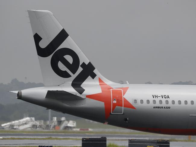 SYDNEY, AUSTRALIA - NewsWire Photos February 25, 2021: QANTAS has reported losses of around 1 billion dollars over the last year, counting the financial cost of Covid-19 on the airline. Jetstar planes are pictured at Sydney airport today. Picture: NCA NewsWire / David Swift