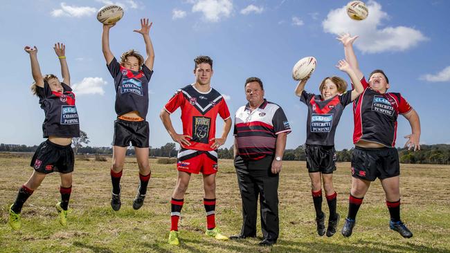 Mudgeeraba captain Kyle Williams with committee member Pieter Berkhout and juniors Miller Raven, Cooper Raven, Vann Raven and Brodie Simmons at the site where they hope to move to in 2020. Picture: Jerad Williams