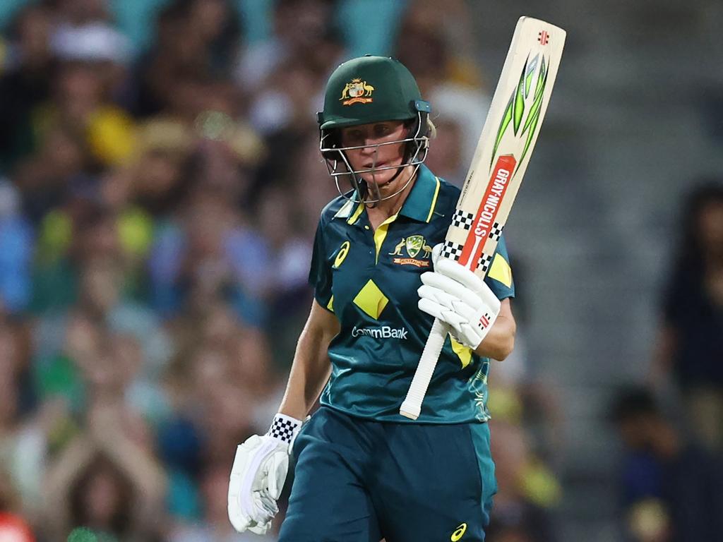 Beth Mooney acknowledges her half century during game one of the Women's Ashes T20 clash with England. Picture: Getty Images