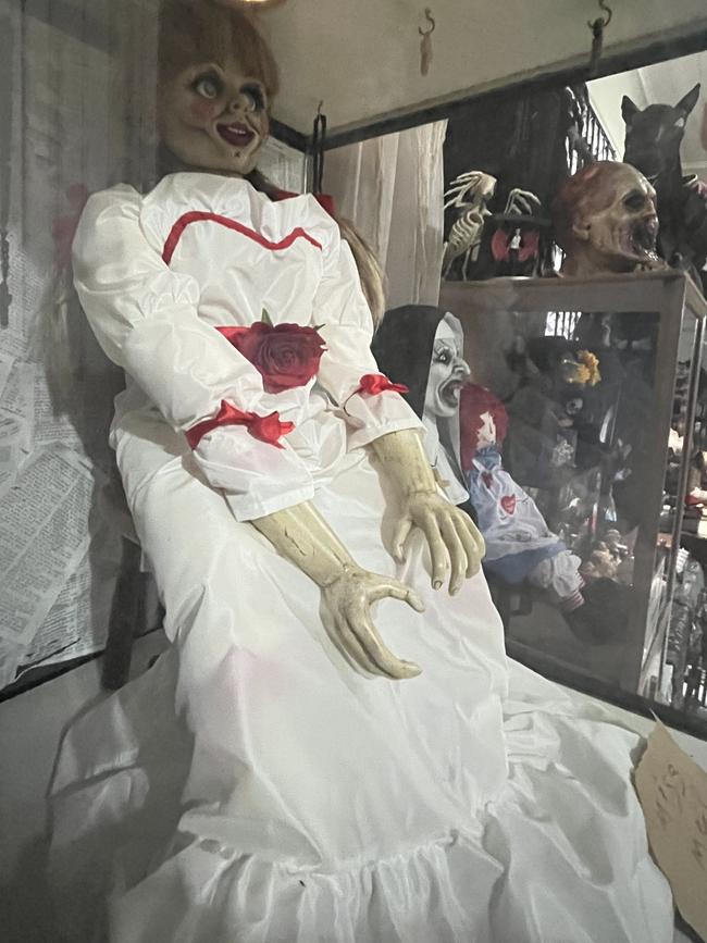 A replica of the Annabelle doll from The Conjuring films.