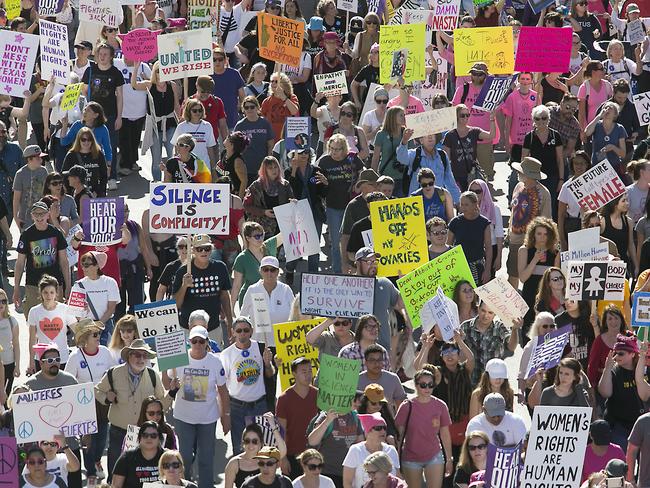 Millions of women around the world marched for women’s rights against Donald Trump at the weekend. Picture: Ralph Barrera/Austin American-Statesman via AP