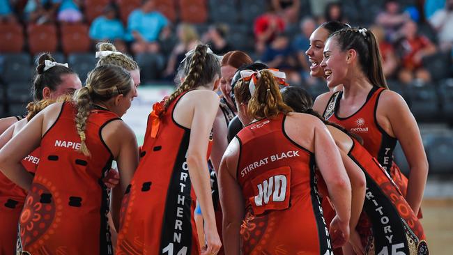 The NT squad gather in a huddle during their match against NSW in the 2023 National Netball Championships. Picture: Pema Tamang Pakhrin