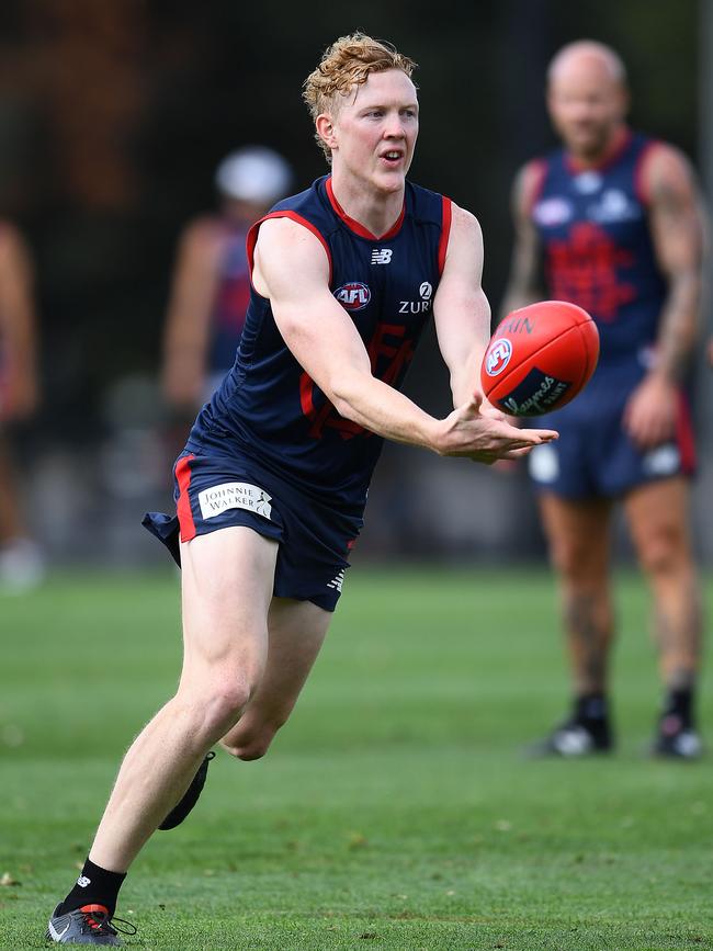 Melbourne star Clayton Oliver has shown no sign of the double shoulder reconstruction he had in the off-season.