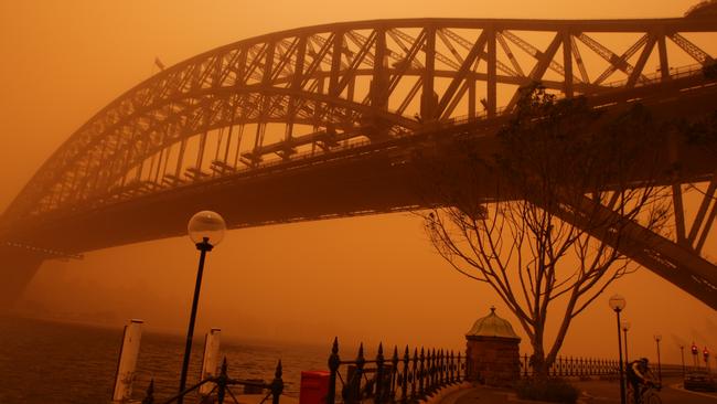 The Harbour Bridge covered in dust in 2009 after the dust storm. Picture: Chris Pavlich 