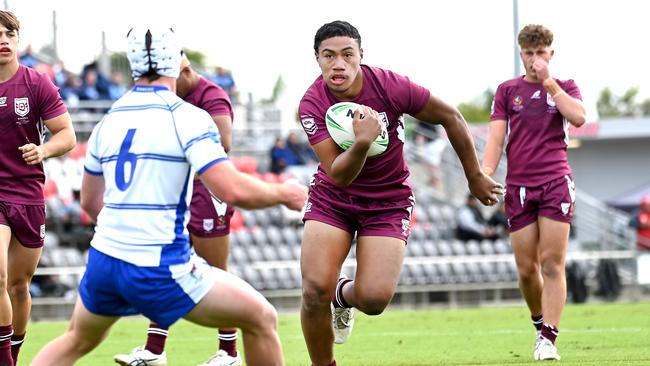 QLD player Will Semu, with Bukowski far left having passed him the ball. Picture, John Gass