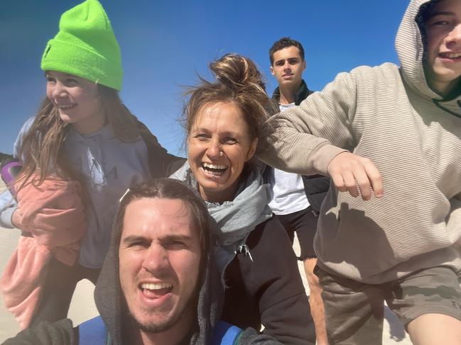 Kasey Chambers in selfie alongside her three children Poet (left), Talon (centre-back) and Arlo (right); and partner, Brandon Dodd. Picture: Supplied