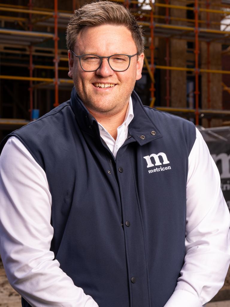 Metricon chief executive Brad Duggan at a housing construction site.